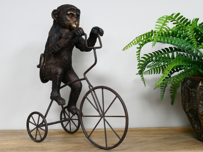 Antique Bronze Monkey on Bicycle Ornament – Quirky Decorative Sculpture