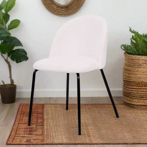 Turi Bouclé Fabric and Black Metal Dining Chair