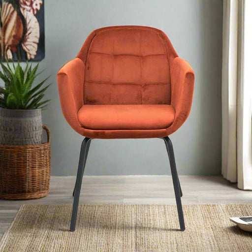 Milan Carver Dining Chair in Burnt Orange Velvet with Black Metal Legs