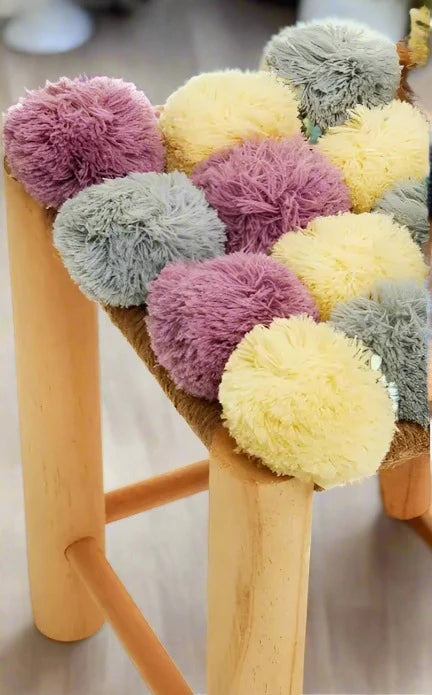 Grey, Yellow, and Pink Pom Pom Footstool with Natural Wood Frame