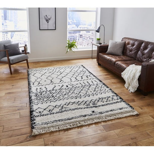 Elegant Black & White Geometric Area Rug - Chic Textured Design with Tassel Fringe - Multiple Sizes