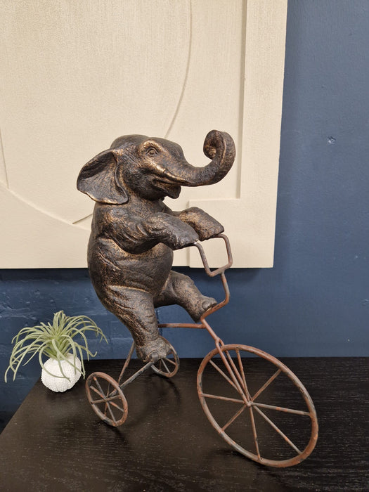 Antique Bronze Elephant on Bicycle Ornament – Whimsical Decorative Sculpture