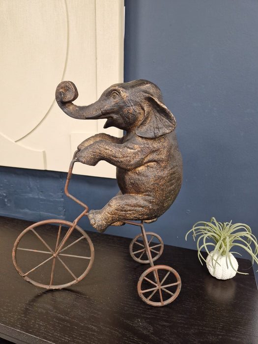 Antique Bronze Elephant on Bicycle Ornament – Whimsical Decorative Sculpture