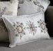 Triple Cream Embroidered Snowflake Cushion