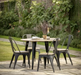 Ponza Outdoor Garden Dining Table, Round, Natural Acadia Wood, Black Metal Legs